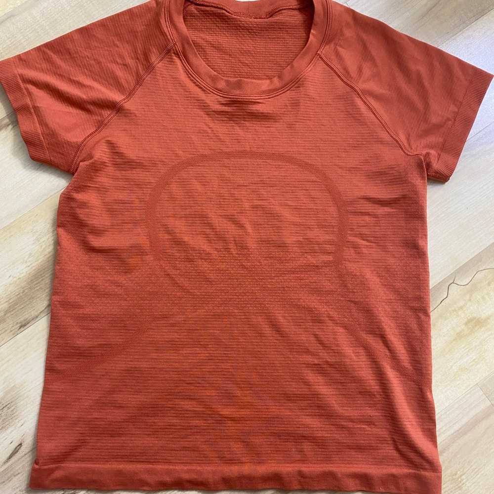 lululemon burnt orange shirt
